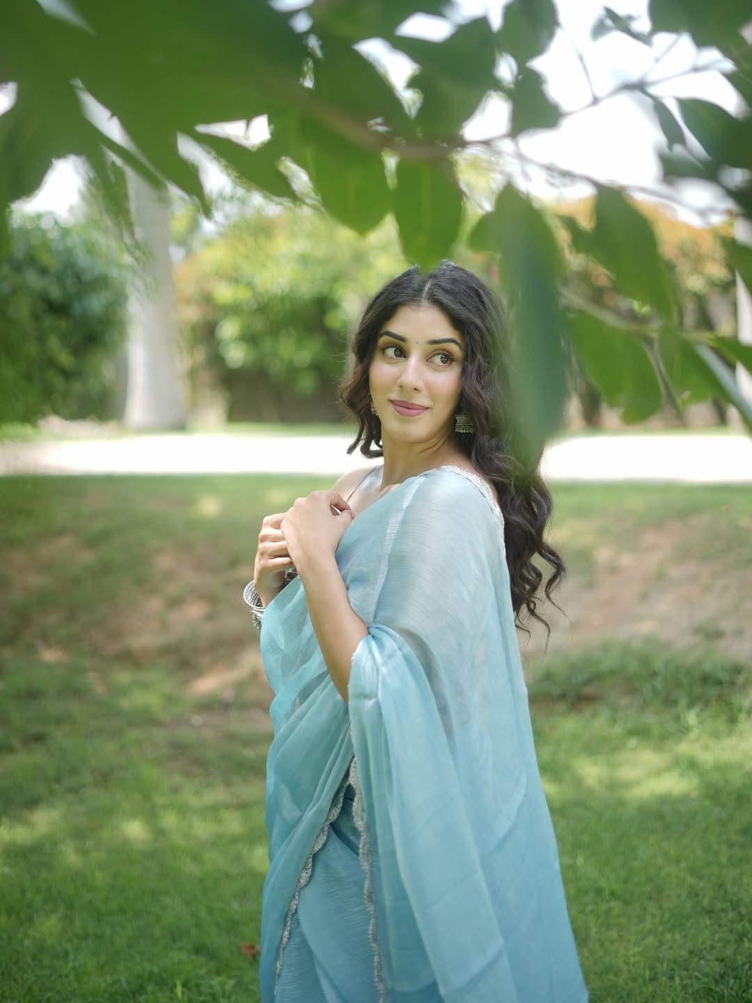 Jasmin Bajwa’s ethereal blue saree proves that elegance doesn’t need to shout – a subtle smile and a dash of style are all she needs to steal the scene!