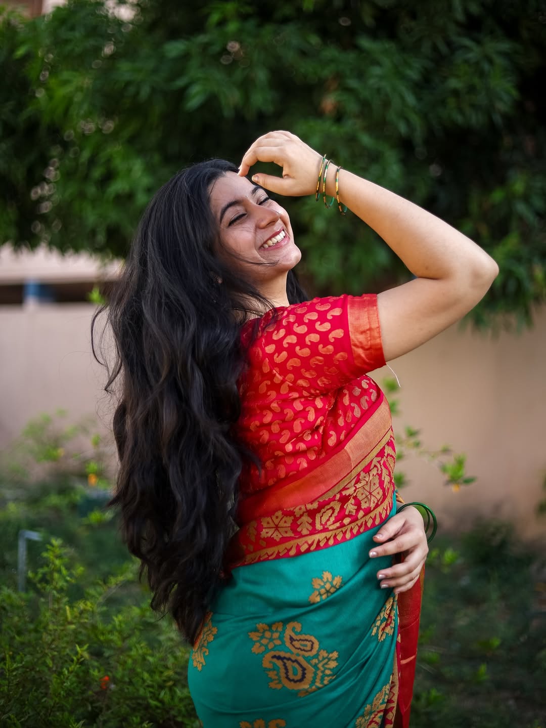 Kanduri Sudha brightens the frame with her vibrant saree and infectious smile–proof that tradition, style, and a dash of humor are the perfect recipe for timeless charm!