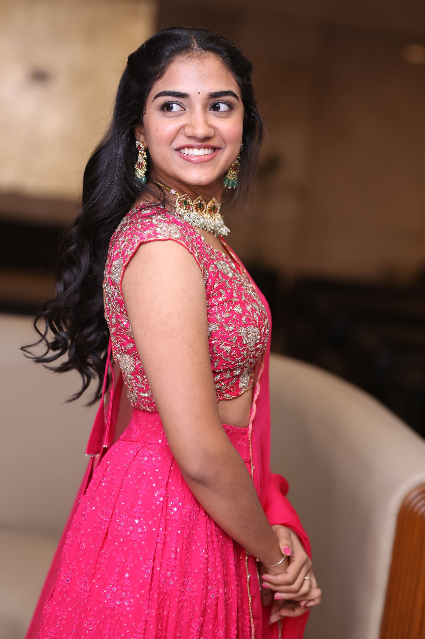 Malavika Manoj radiates timeless elegance in her vibrant pink attire, proving that style, grace, and a touch of humor are the perfect ingredients for making an unforgettable impression!