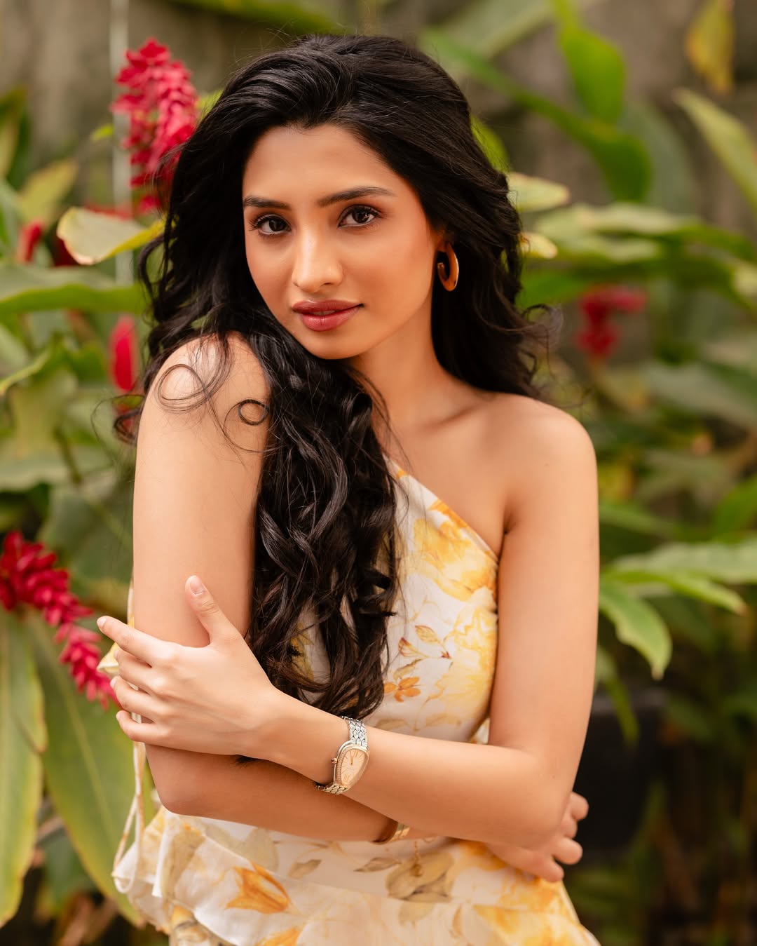 Manisha Kandkur effortlessly blends elegance with a hint of playful charm–radiating sunshine in her floral dress while giving the camera that irresistible, 