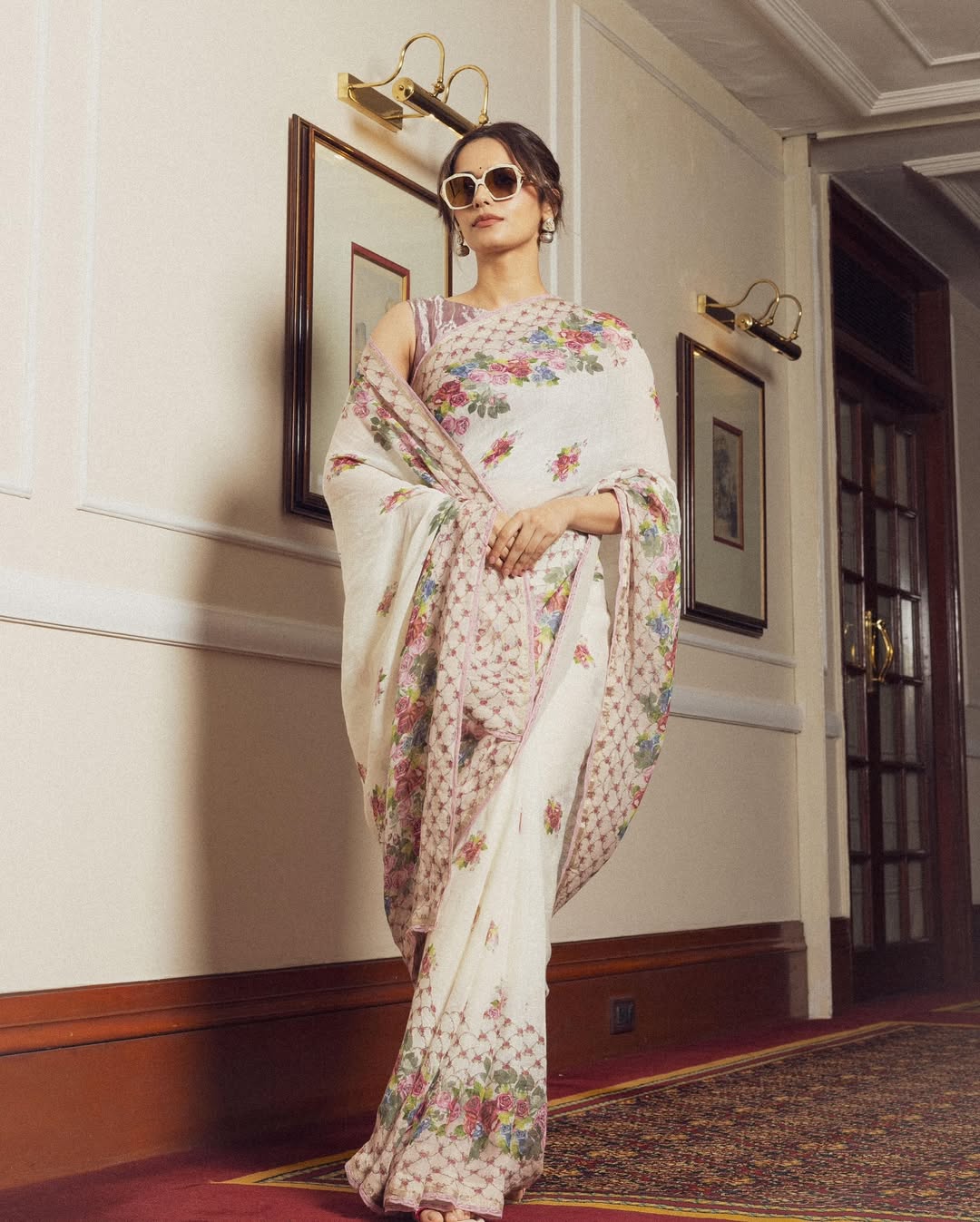 Manushi Chhillar effortlessly combines timeless grace with modern sass–proof that a saree, sunglasses, and a confident stance are the ultimate power trio!