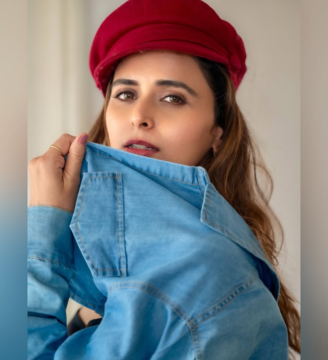 Meenakshi Dixit rocks the perfect blend of classic charm and modern sass–dressed to impress, with a wink of humor hidden in that confident gaze!