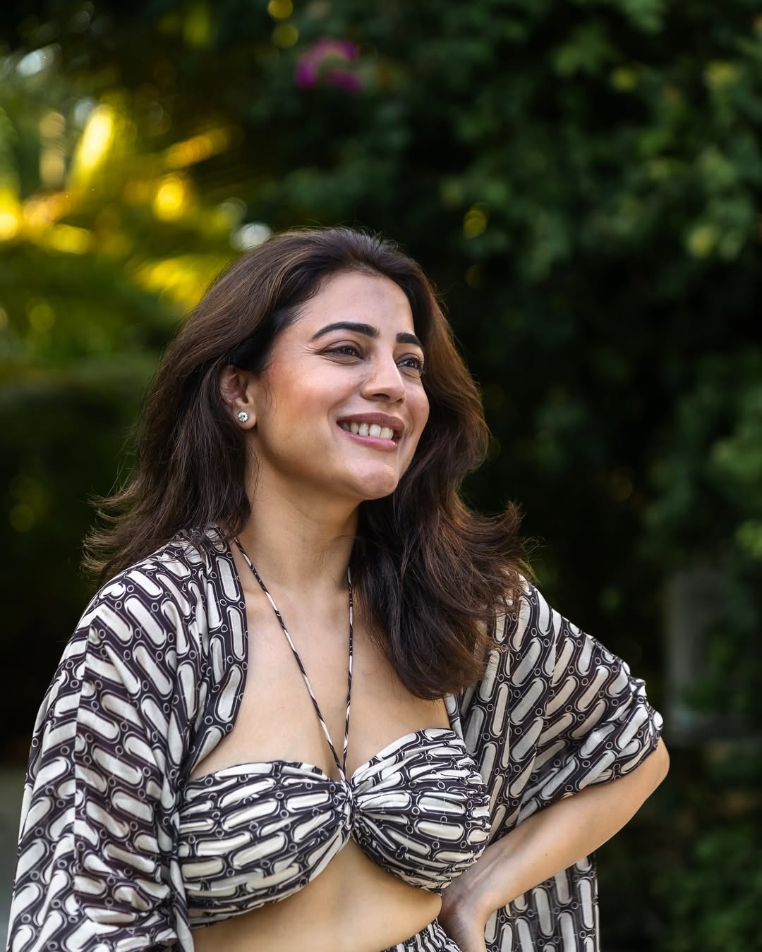 Nisha Aggarwal radiates pure summer magic with a smile so dazzling, even the sun’s feeling upstaged by her effortless glow and breezy confidence