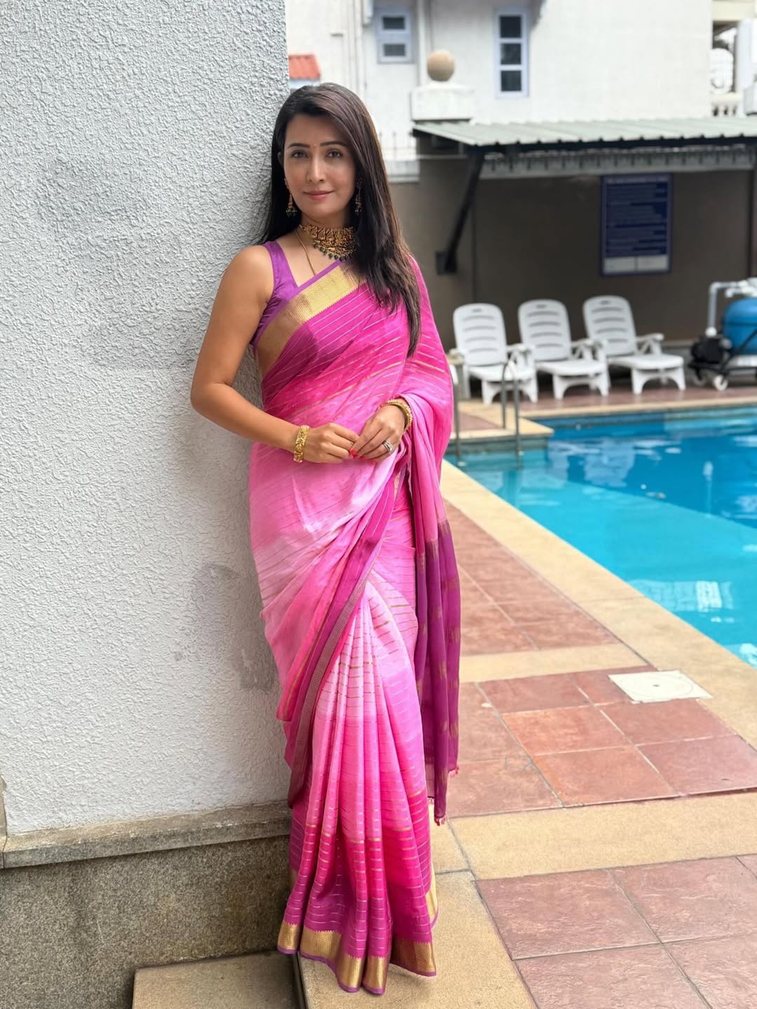 Radhika Pandit slays in a vibrant pink saree, proving that elegance and a splash of boldness make the perfect poolside power combo–style that’s as refreshing as the swim!