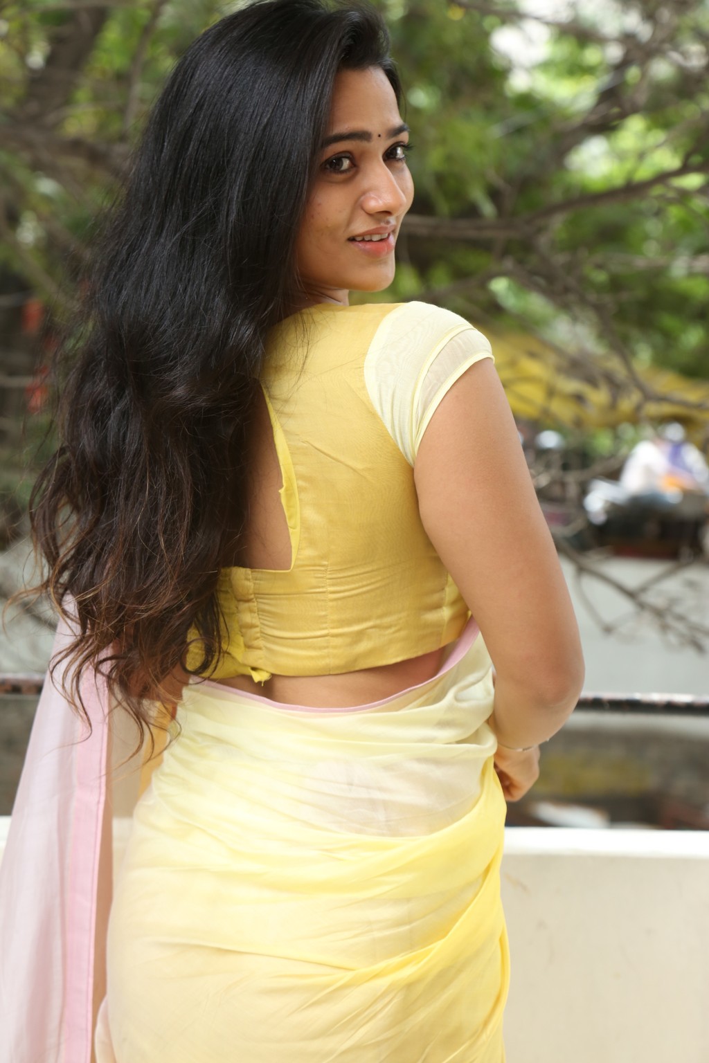 Rekha Nirosha effortlessly combines tradition with a touch of mischief, proving that a sunny yellow saree and a confident smile are the perfect recipe for turning heads–and maybe even a few hearts!