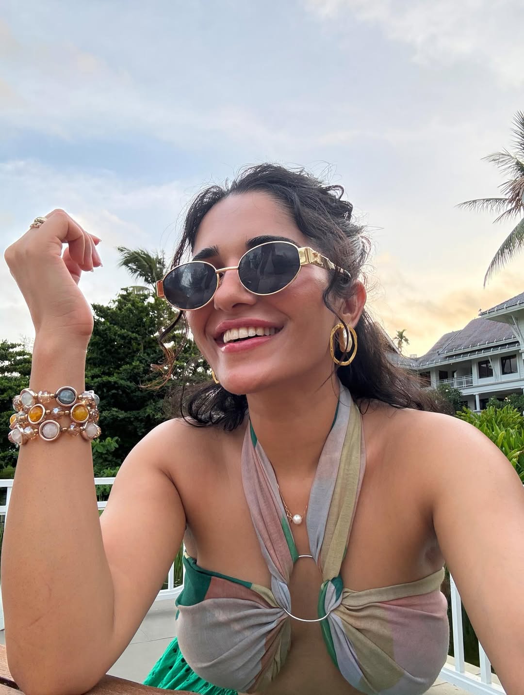 Ruhani Sharma effortlessly blends sunshine and style–proof that a chic twist and a confident smile are the best accessories for any sunny day!