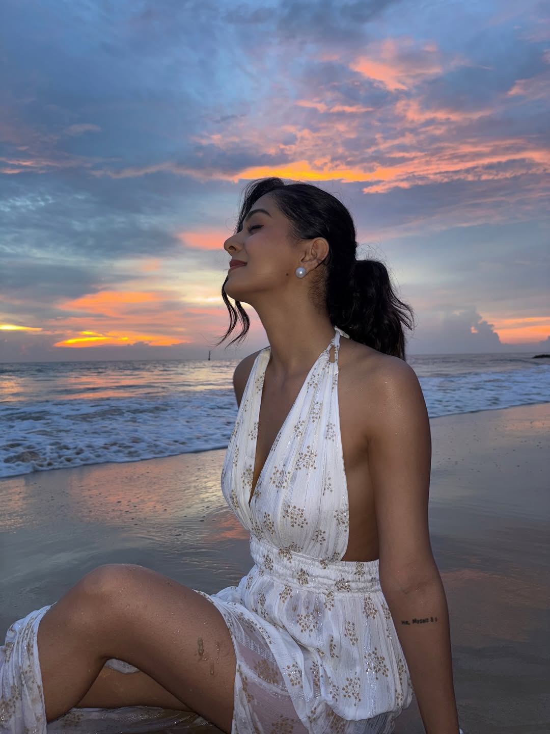 Rutvi Tiwari proving that serenity and style go hand in hand – rocking white, soaking up sunset vibes, and making beach days look effortlessly chic!