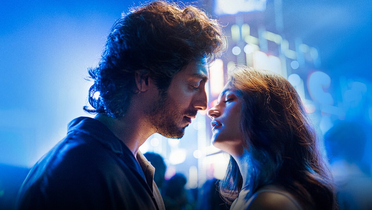 An intense romantic scene as Ahaan Panday and Aneet Padda share a near-kiss moment.