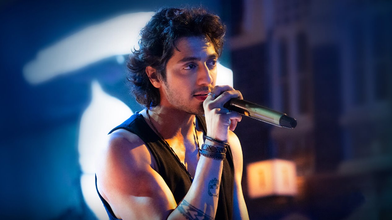 A musical sequence featuring Ahaan Panday singing with heartfelt expression.