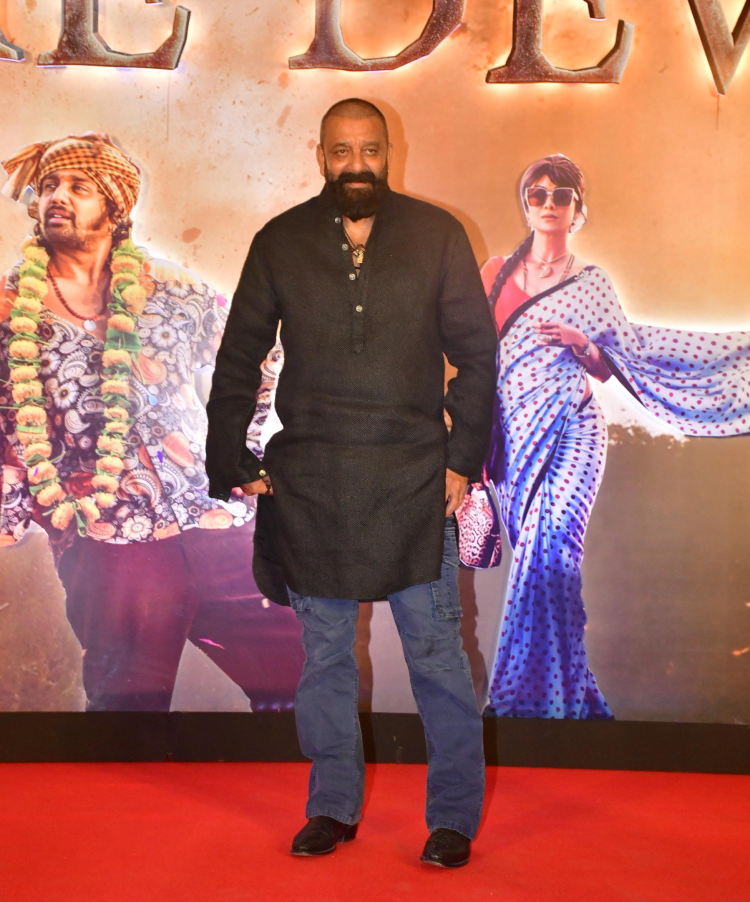 Sanjay Dutt strikes a poised moment for the media lens.