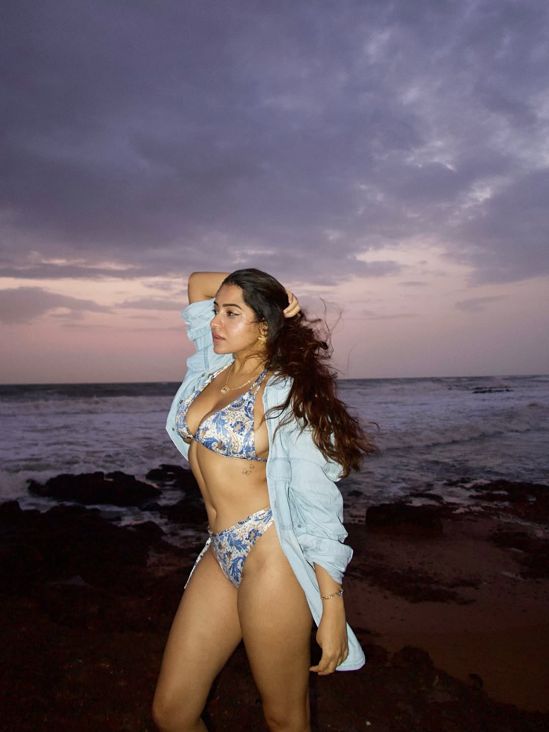Simran Kaur's beachside glam proves that even in a bikini and a casual shirt, she’s got the perfect blend of style, sass, and a sunset-ready smile–making waves in both fashion and humor!