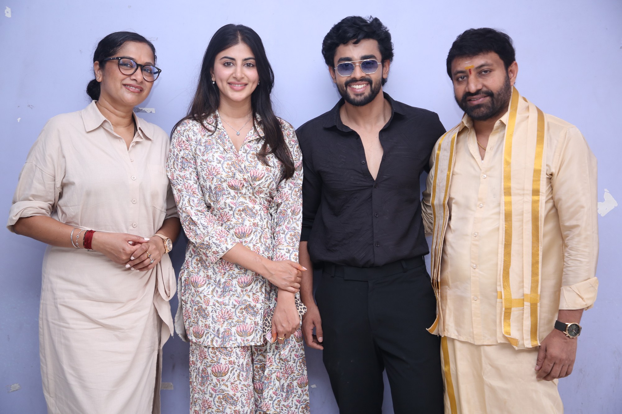 Swetha Avasthi, Gautham Krishna, and Producer Seven Hills Satish share a cheerful frame during the official photoshoot session.