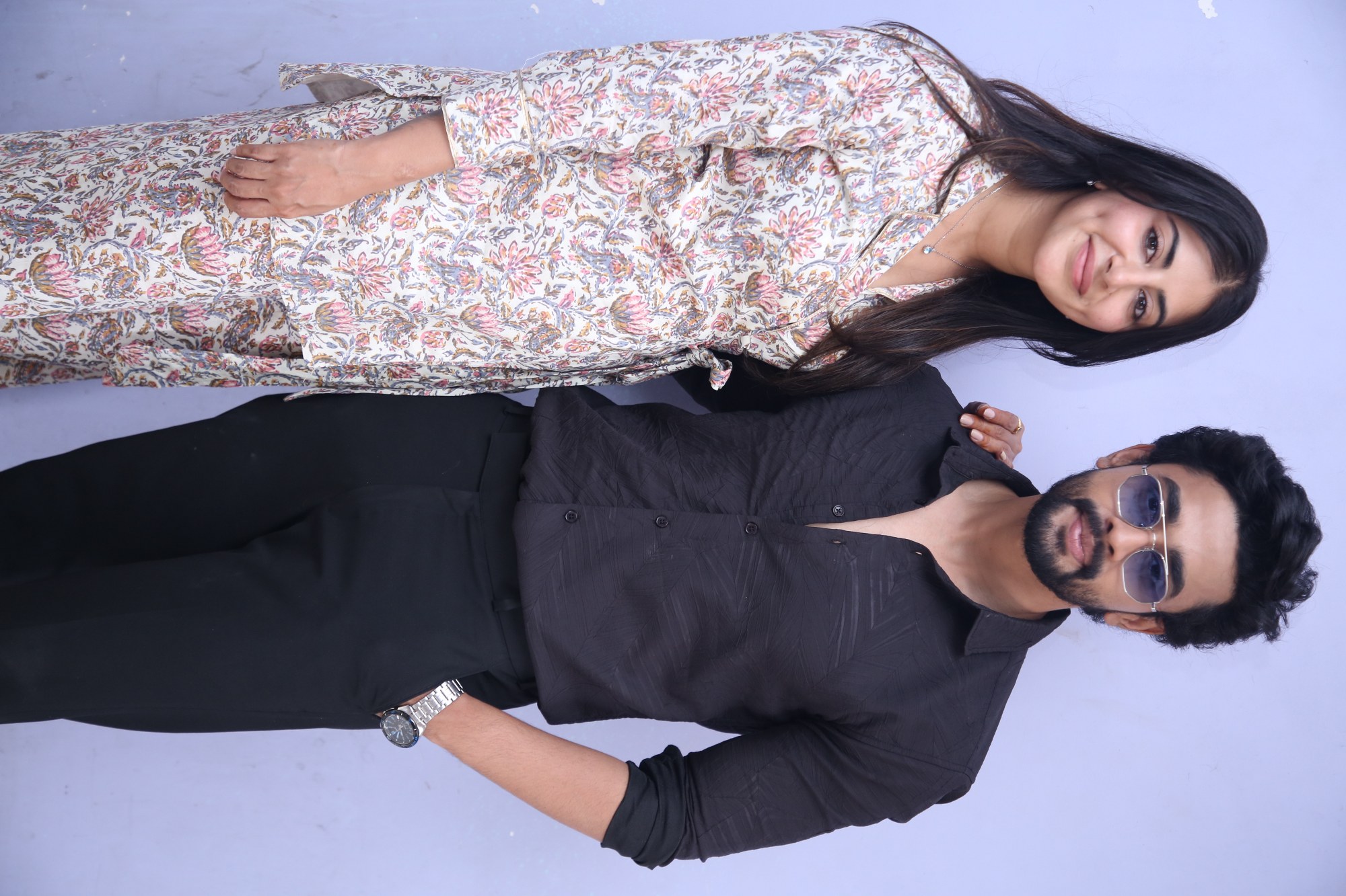 Swetha Avasthi and Gautham Krishna showcase a friendly moment as they pose for photographers.