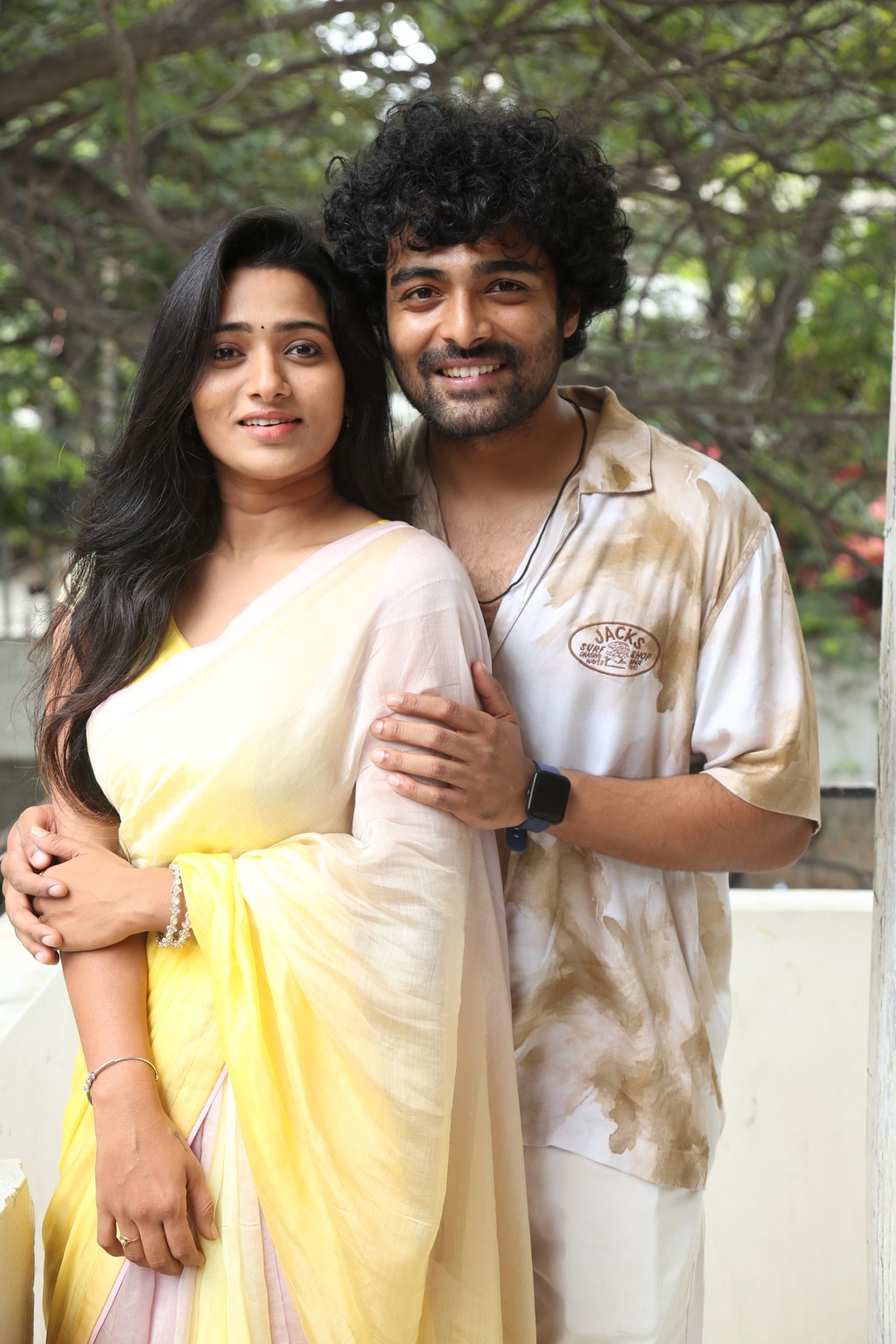 Rekha Nirosha and Dhanush Raghumudri pose elegantly for the media at the event.
