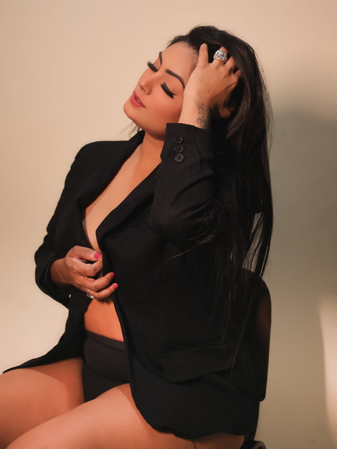 Mastering the art of power dressing–boss lady by day, style icon by night, and always ready to turn heads with a daring twist!