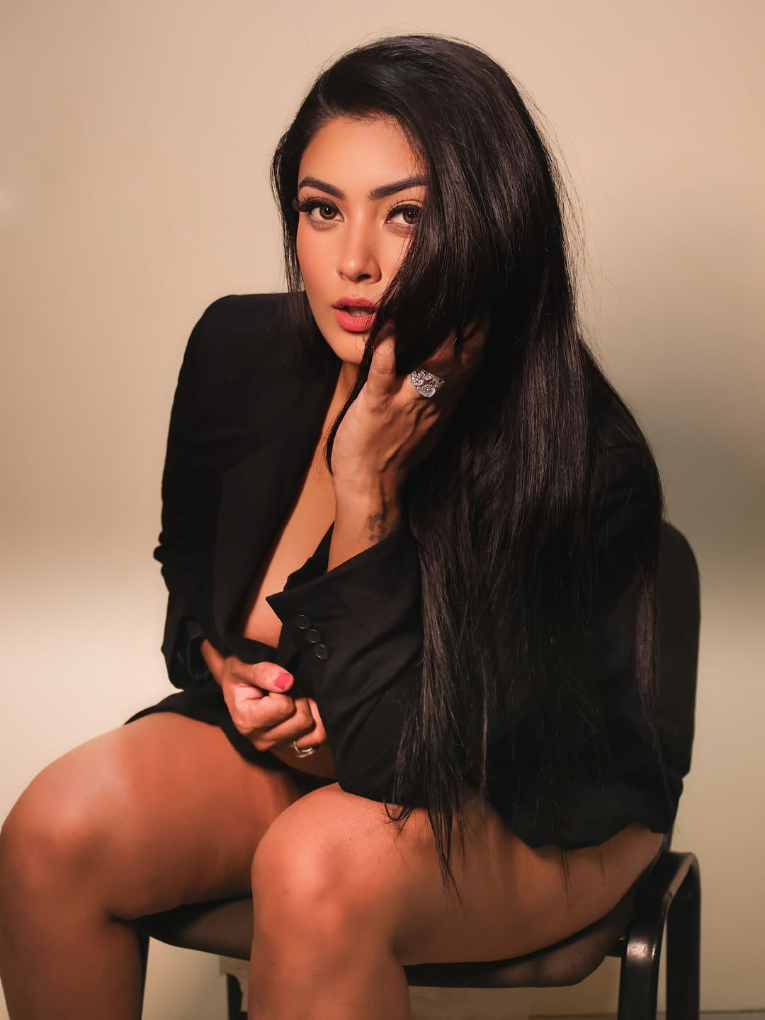 Effortlessly blending elegance with edge – because sometimes, a little black dress and a fierce stare are all you need to steal the spotlight!