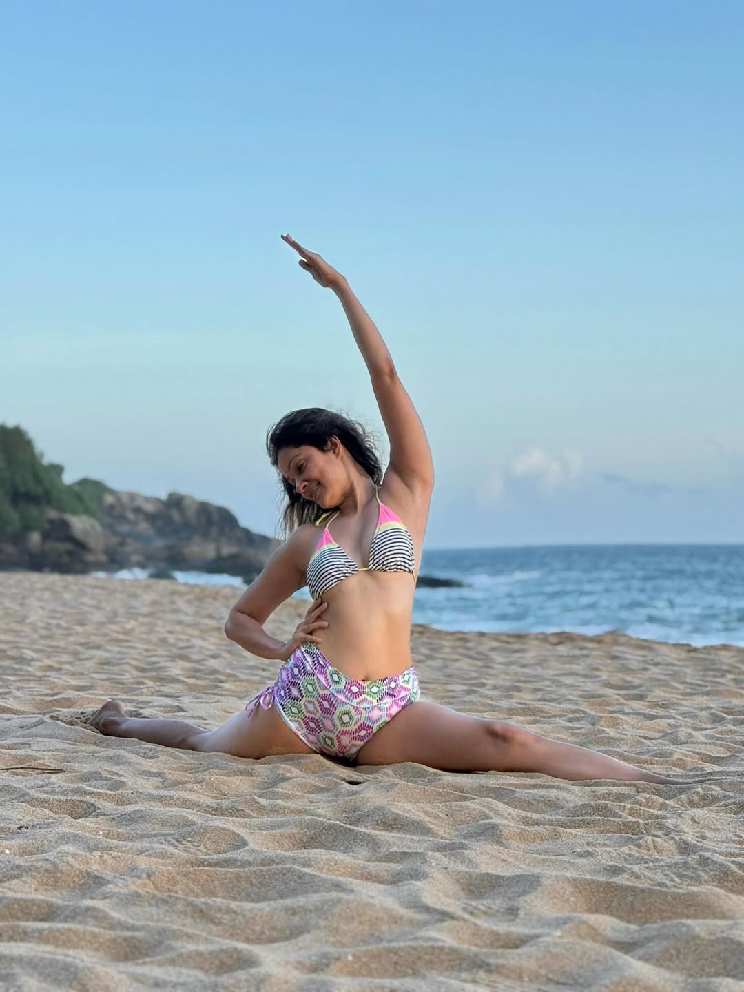 Beach vibes and yoga tribes–Vidya's bikini game is as flexible as her pose, proving that even the ocean can't resist her style and smile
