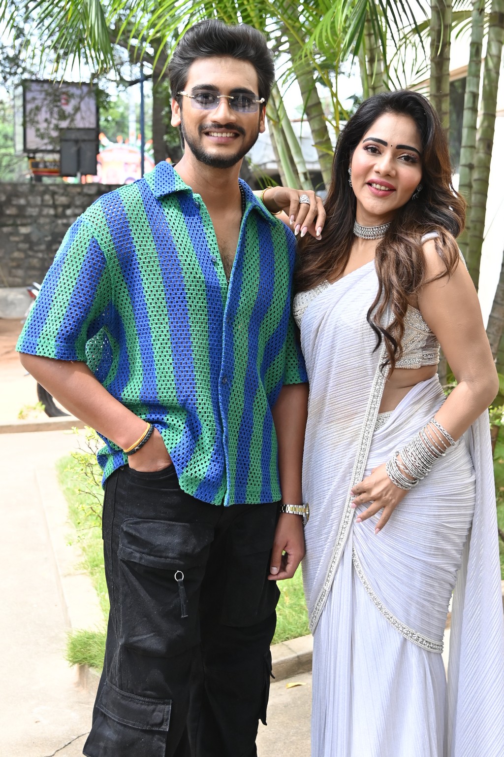 Geethanandh and Mitraaw Sharma capture a stylish moment while posing at the media photoshoot
