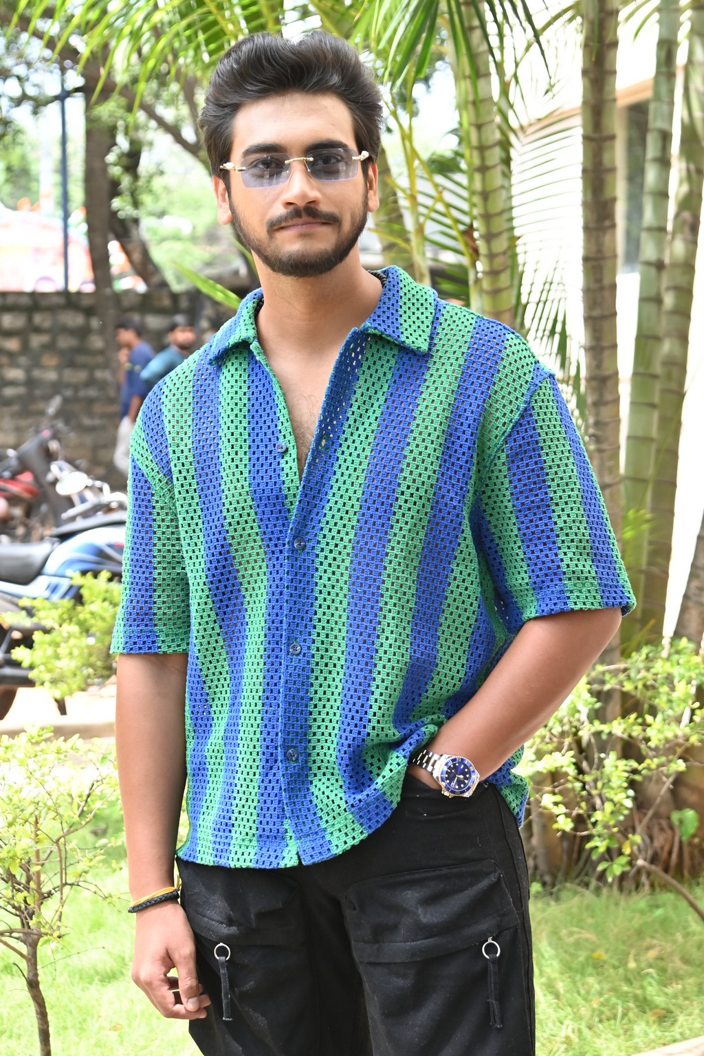 Geethanandh strikes a confident pose, exuding charm during the media photoshoot