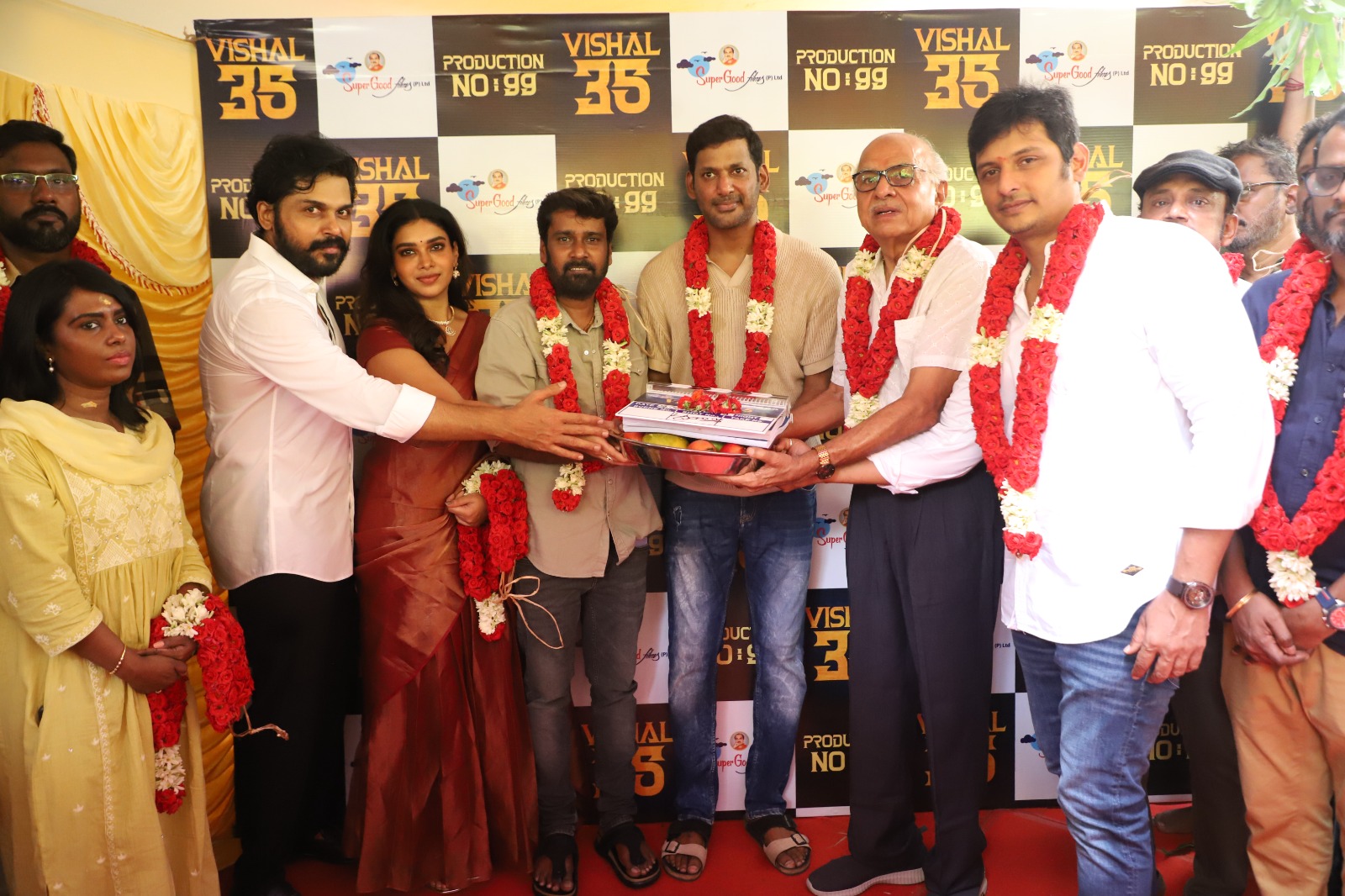 Vishal, Dushara Vijayan, director Raviarasu, and the team participate in the traditional pooja ceremony