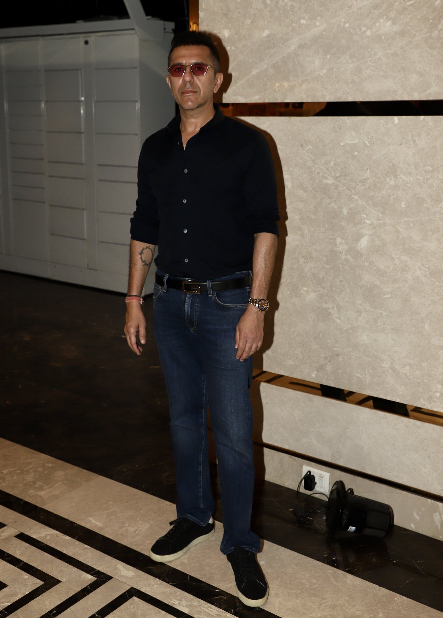 Producer Ritesh Sidhwani makes a striking appearance as he poses solo for the shutterbugs at the event.