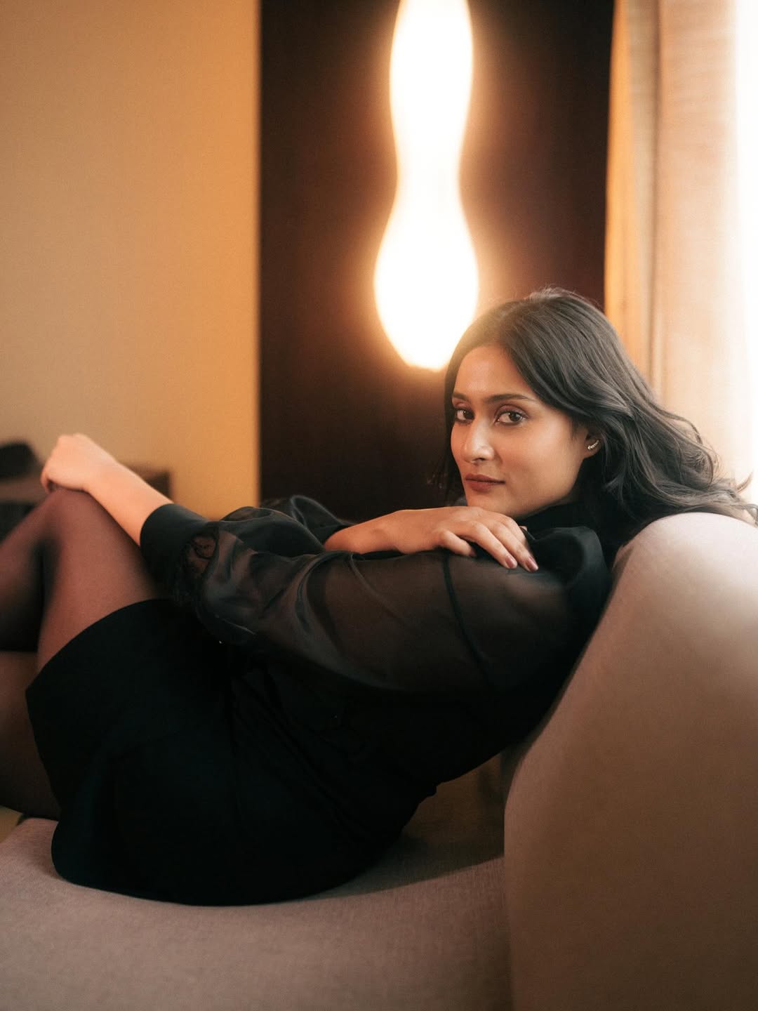 Amrutha Iyengar masterfully blends timeless elegance with a touch of playful sophistication–proof that style and humor are her best accessories.