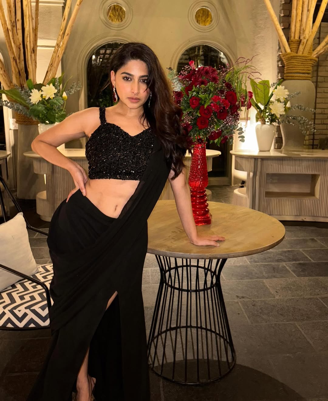 Nishvika Naidu stuns in black saree elegance