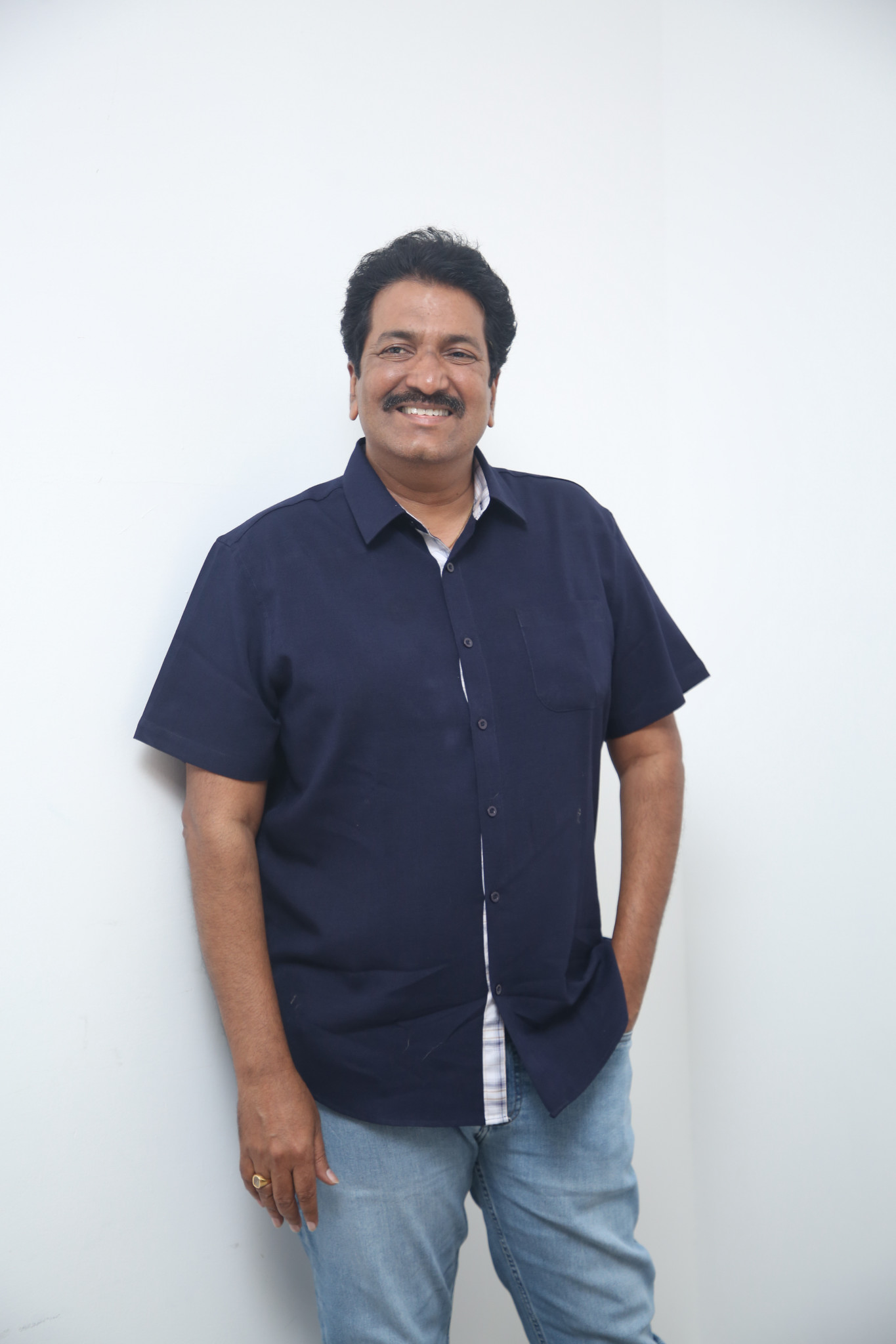 Anil Sunkara relaxed pose with effortless professional style