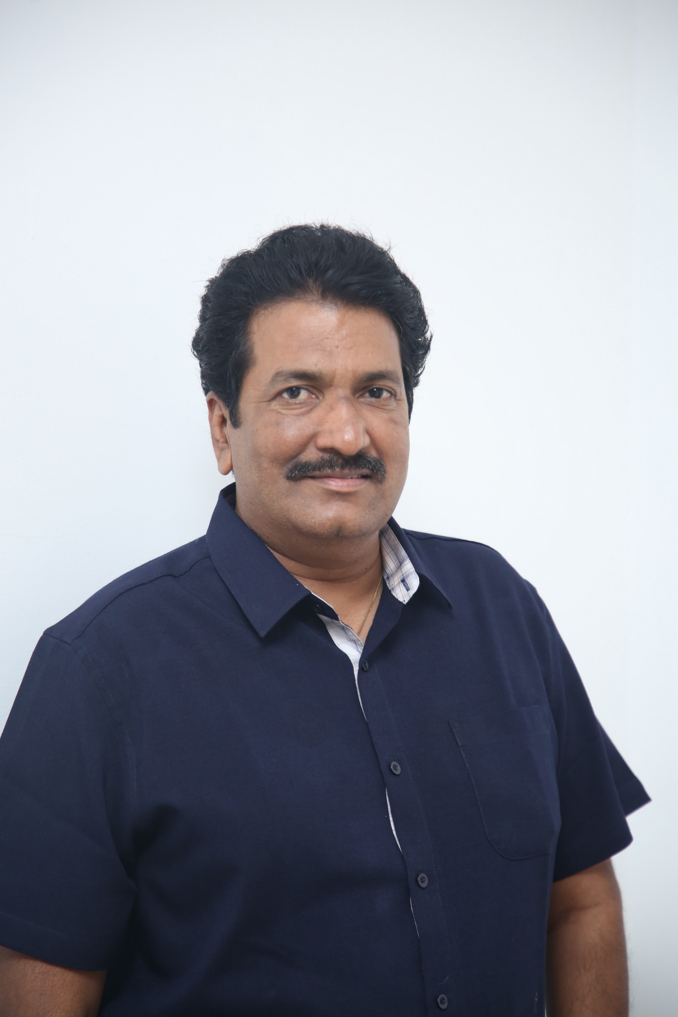 Anil Sunkara sharp dress sense with confident stance