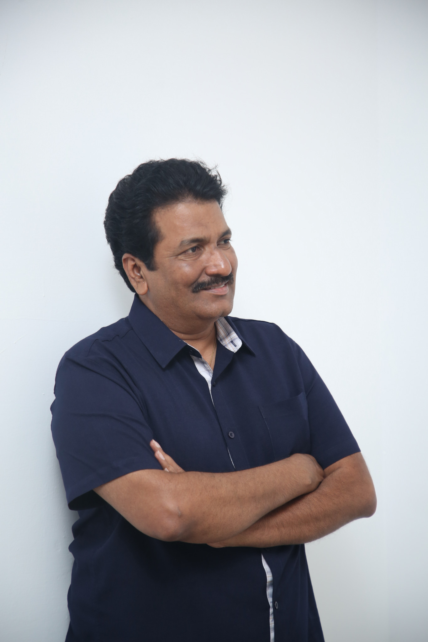 Anil Sunkara sharp attire with confident professional pose