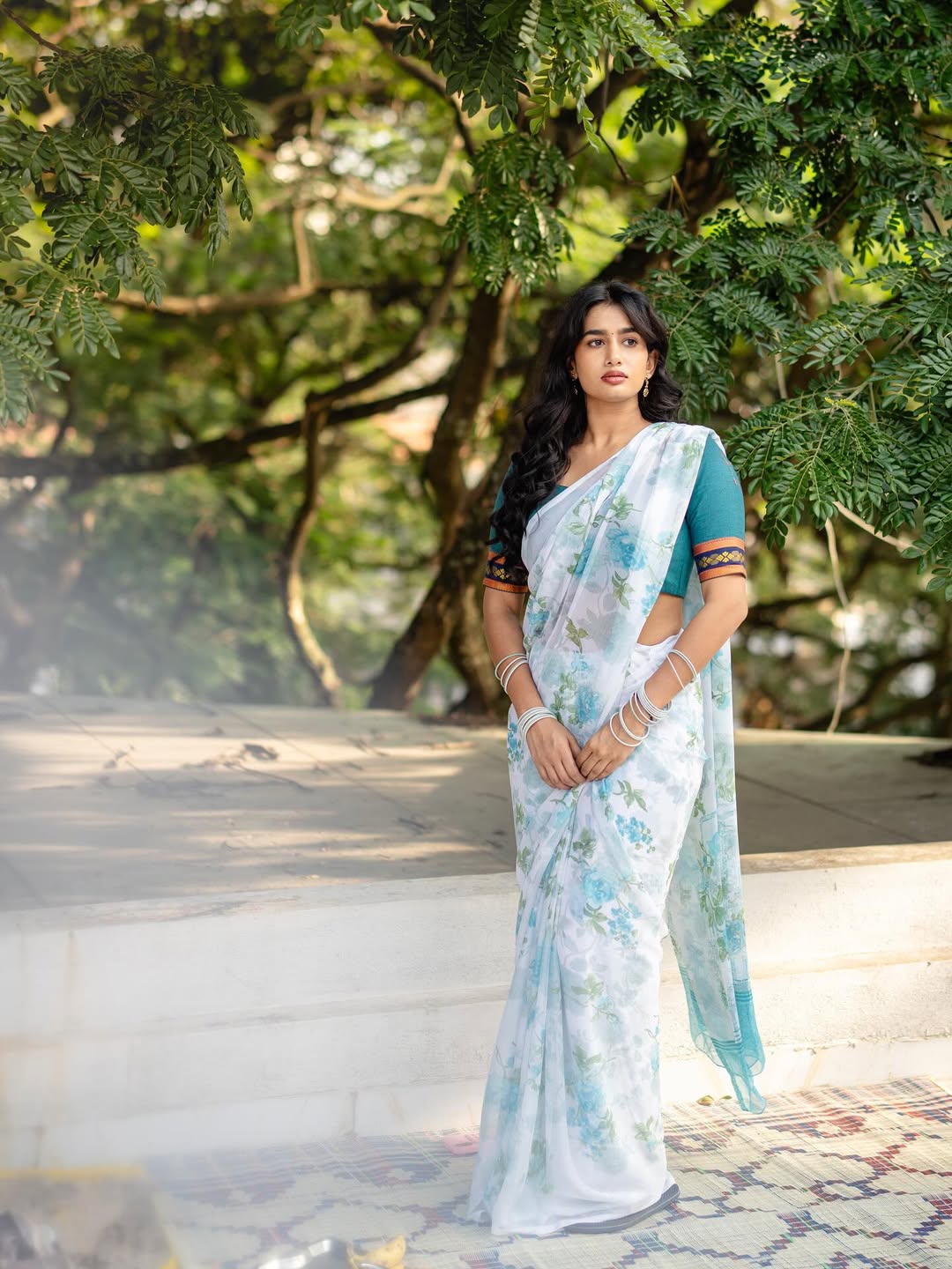 Anjali Anish in saree on leafy runway