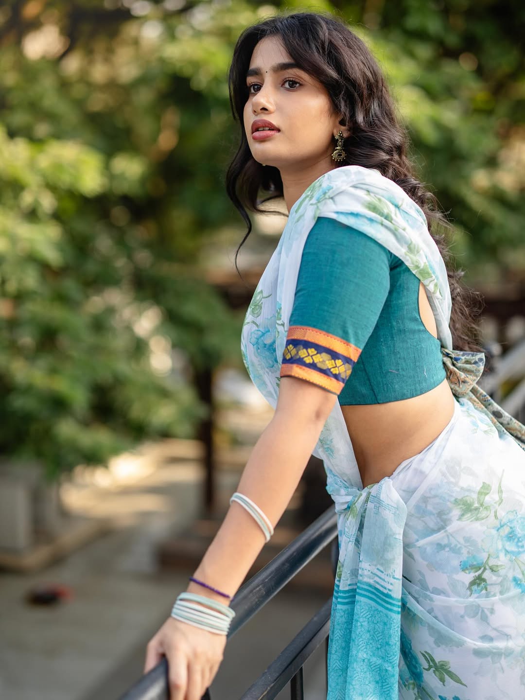 Anjali Anish in elegant, blurred-face fashion