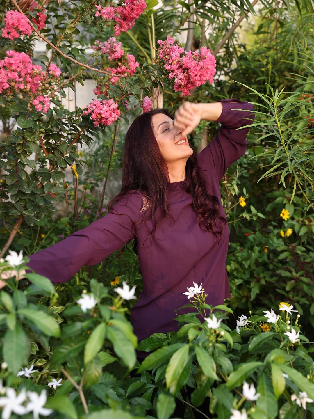Bhumika Chawla masterfully blends into the floral symphony, proving that elegance and a touch of humor can bloom in every pose.
