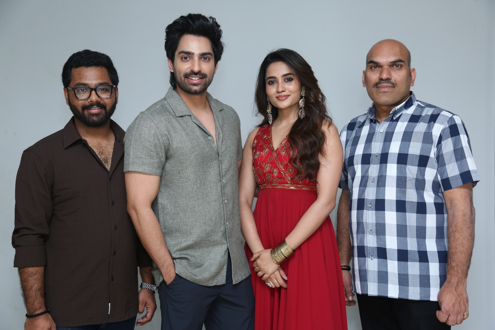 Trio posing gracefully during media photoshoot