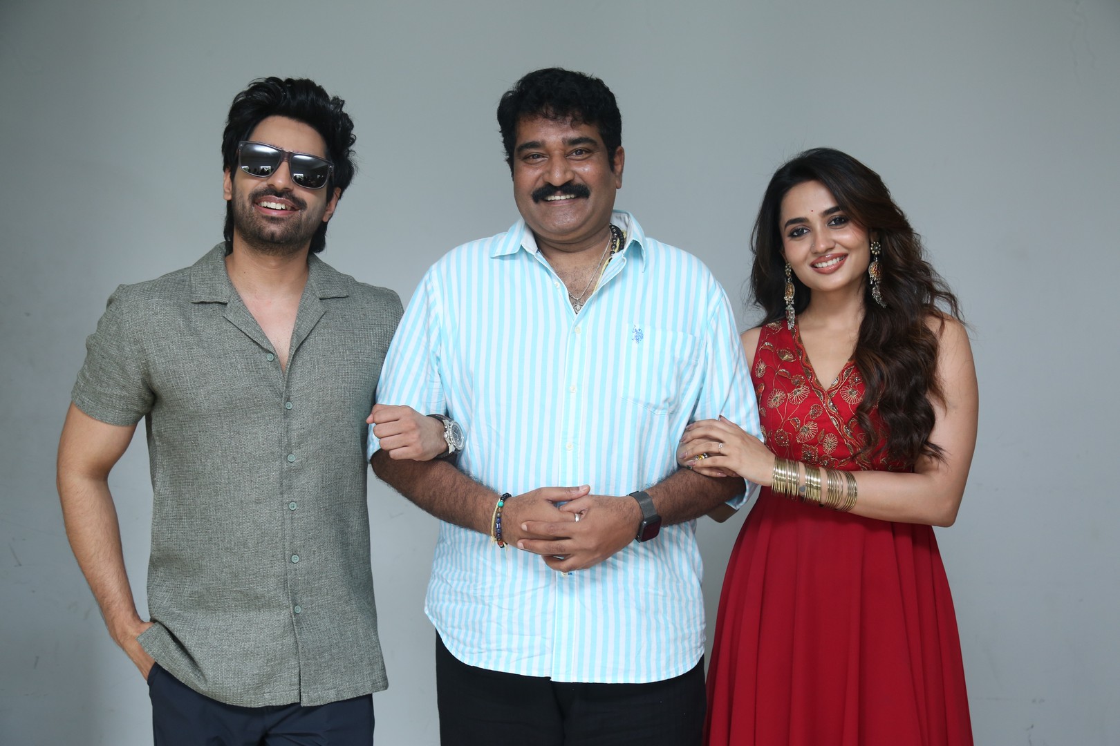 Lead cast posing for media spotlight