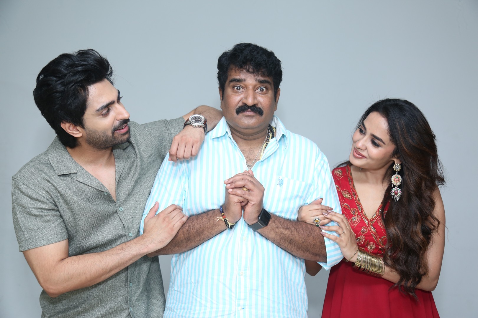 Cast in a lighthearted moment at photoshoot