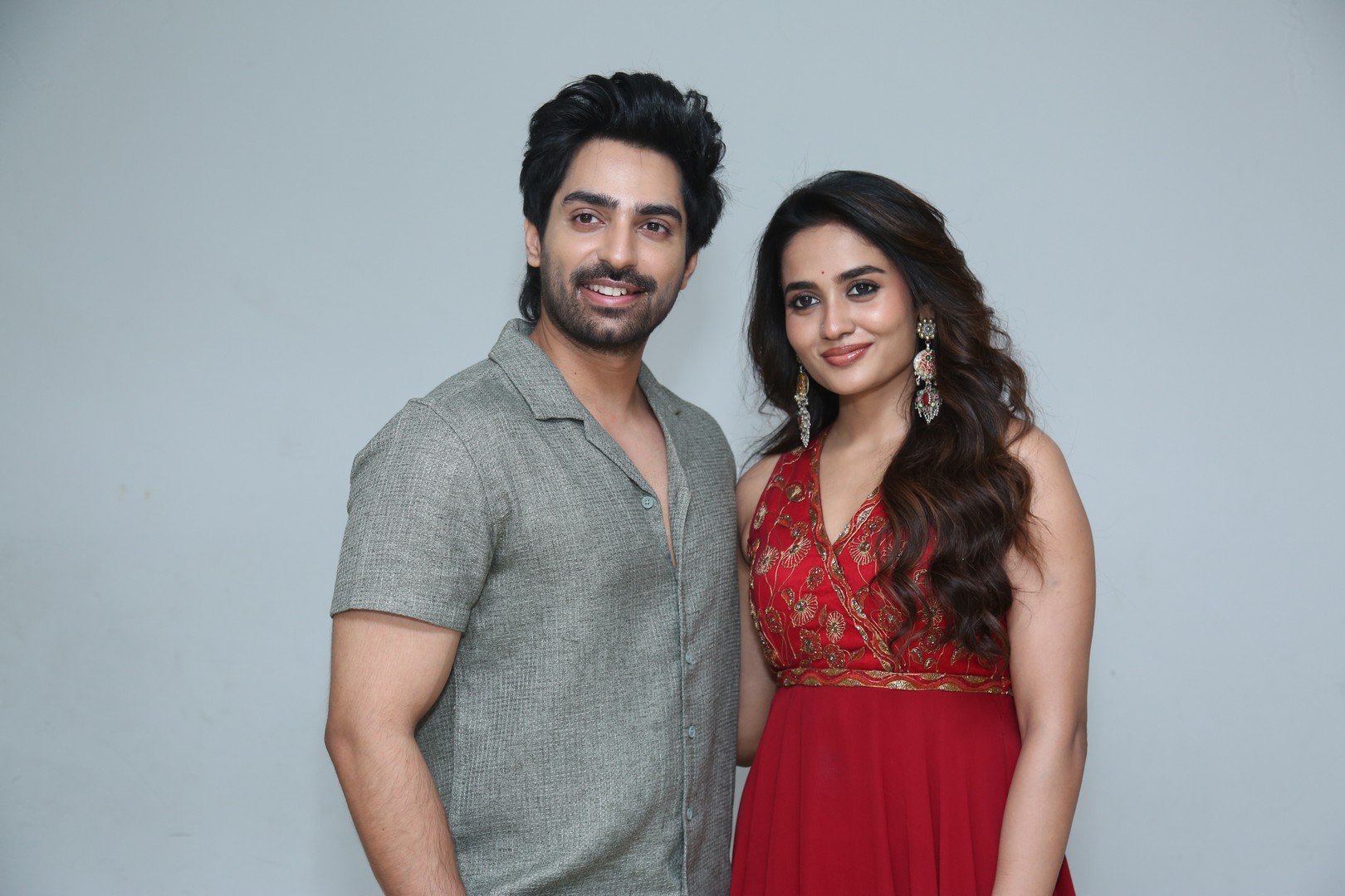 Duo posing with charm for photoshoot