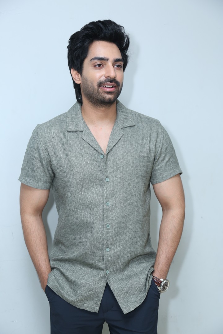 Shiva Kandukuri posing stylishly for photoshoot