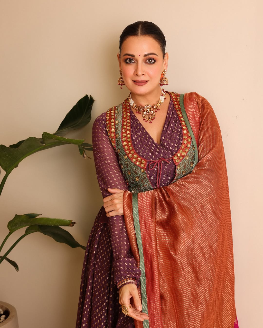 Dia Mirza radiates elegance with a hint of mischief.