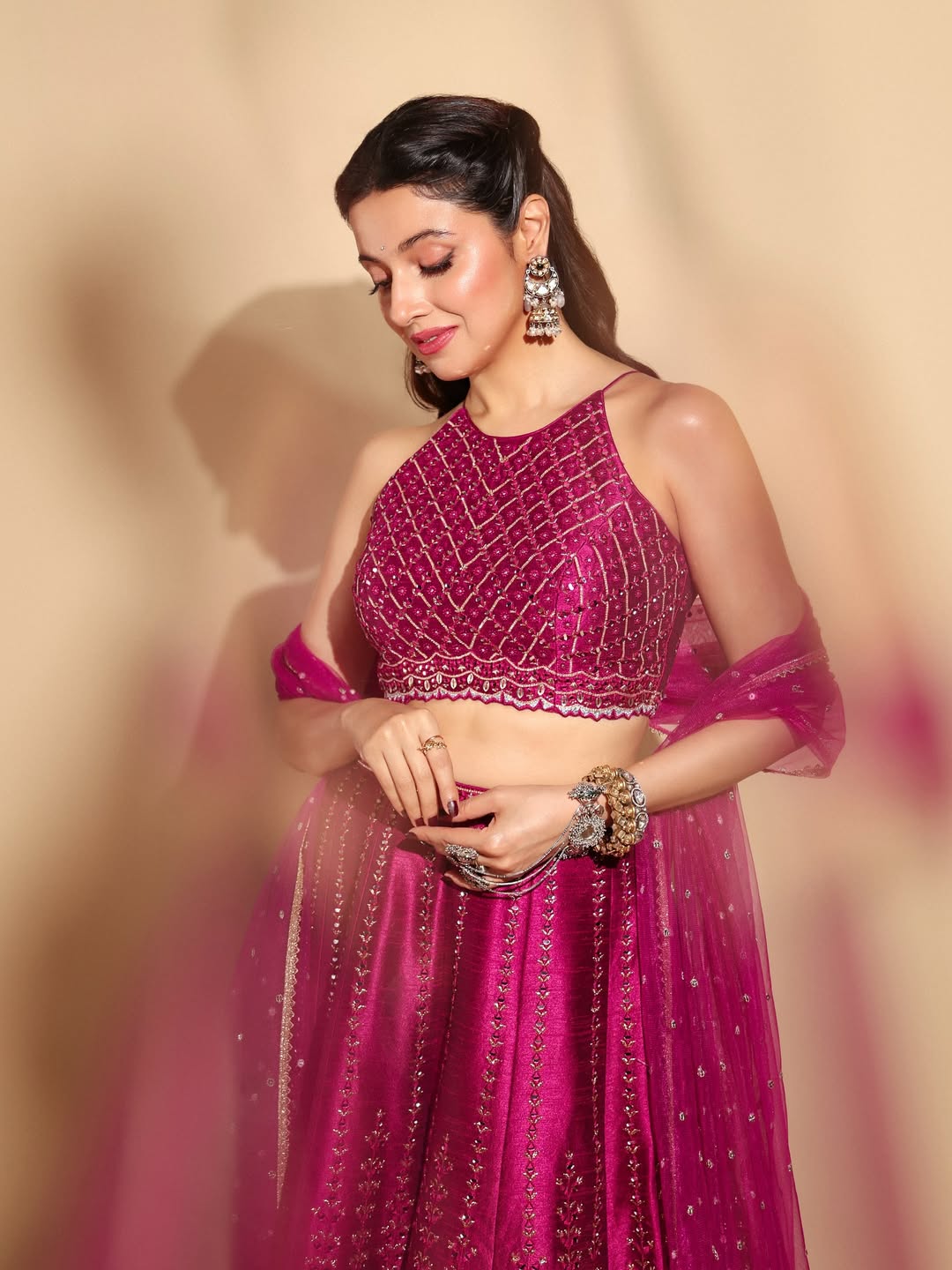 Divya Khosla in pink traditional ensemble with elegance