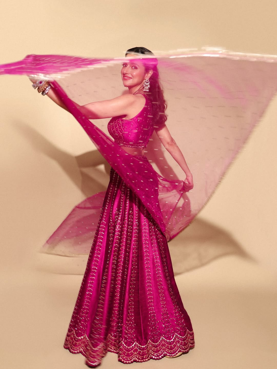 Divya Khosla blends tradition and glam in vibrant pink