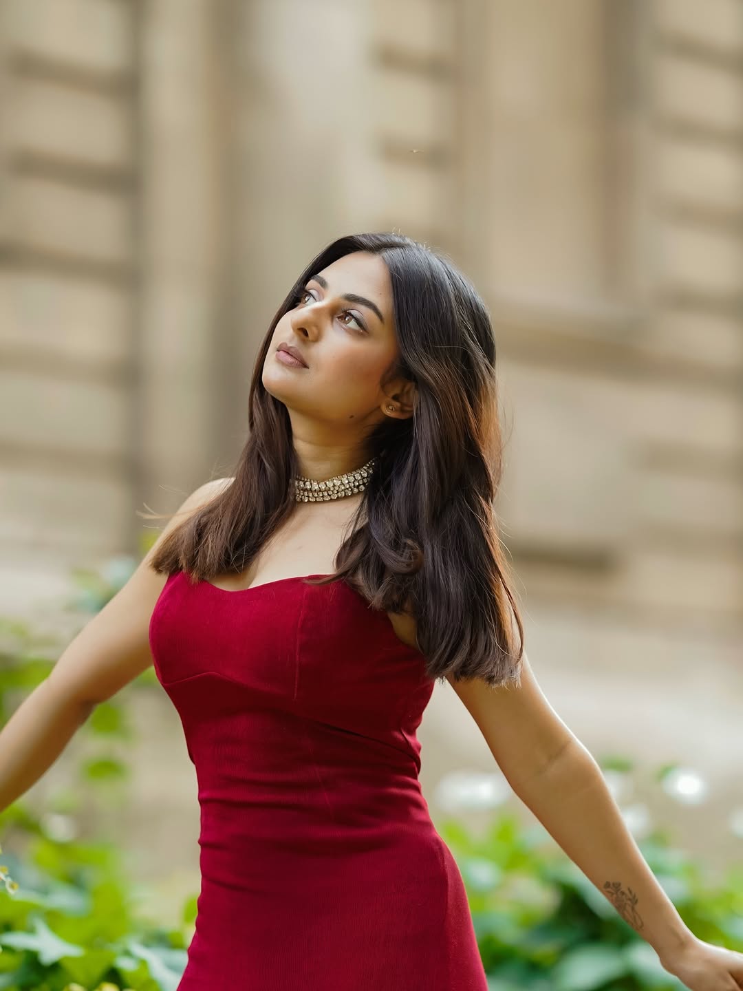 Esther Anil radiates confidence and elegance in red