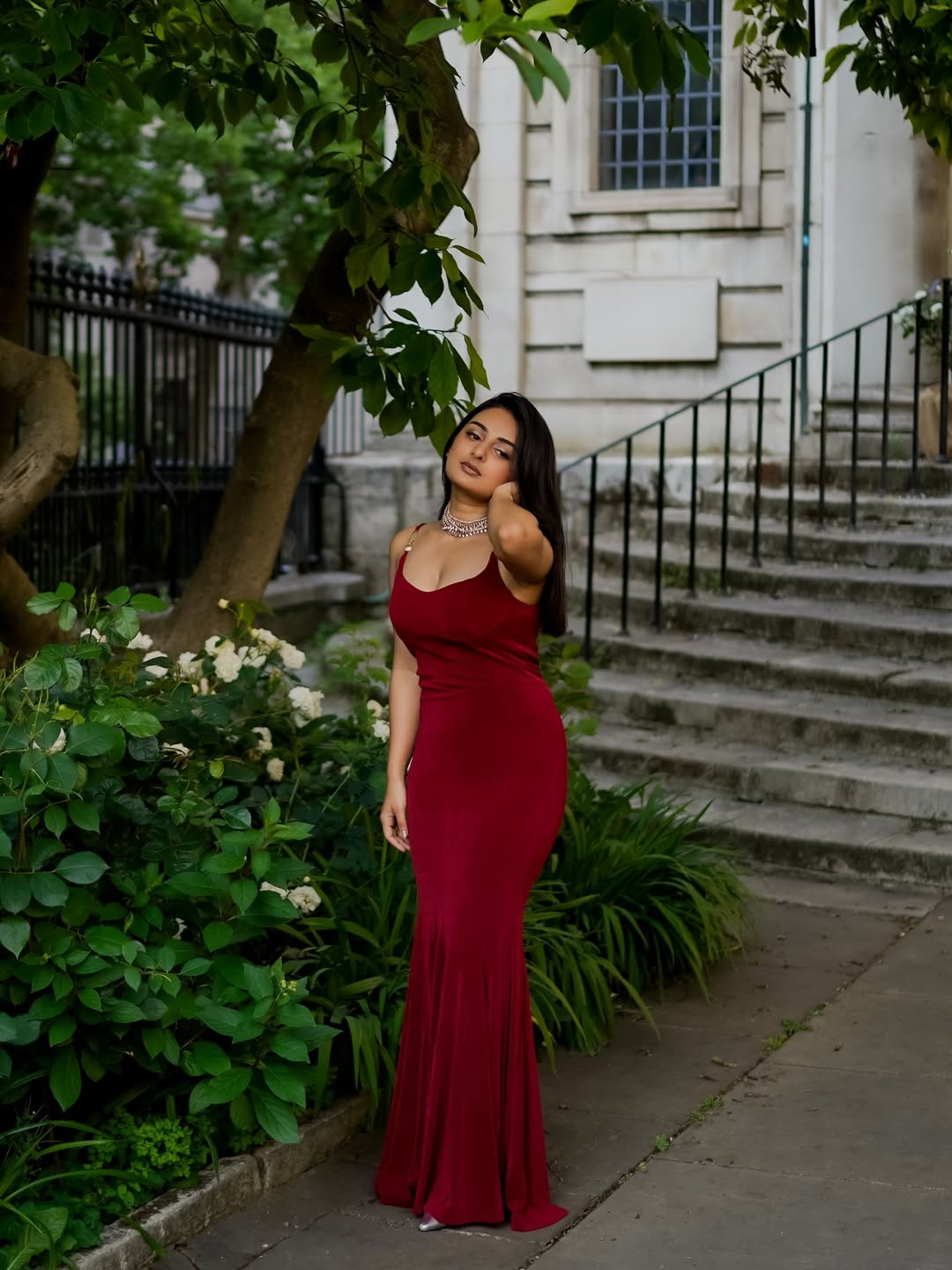 Esther Anil stuns in red gown with grace