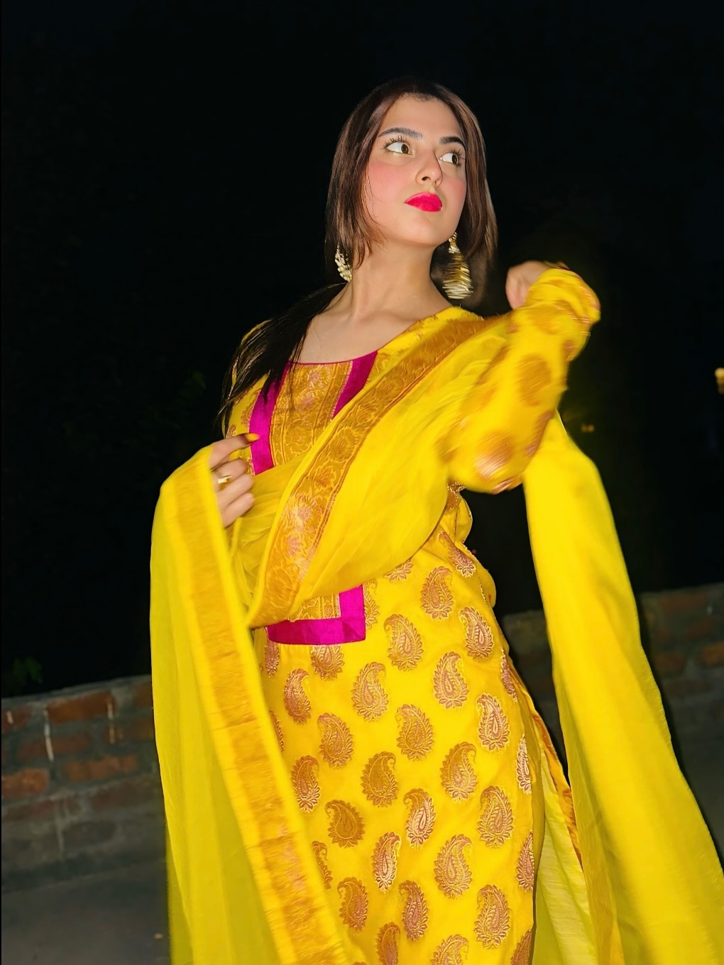 Farhana Bhatt glowing in vibrant yellow traditional wear