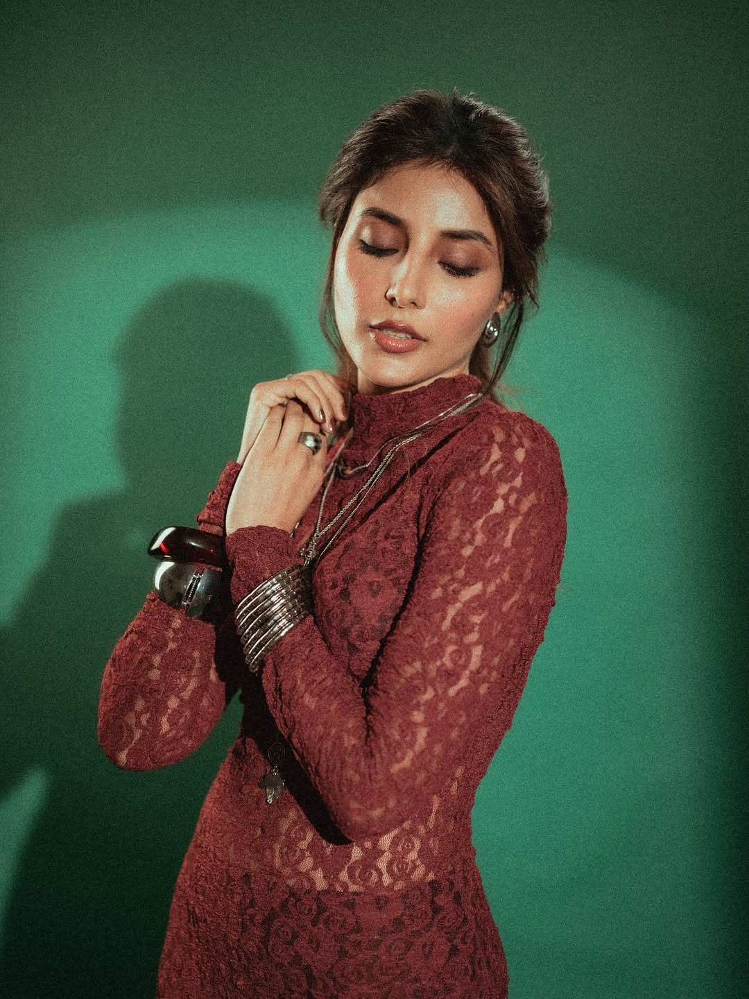 Harshita Gaur rocks a sophisticated maroon lace ensemble, proving that timeless elegance with a touch of boldness can make any moment a style statement–who says you can't have fun with fashion?
