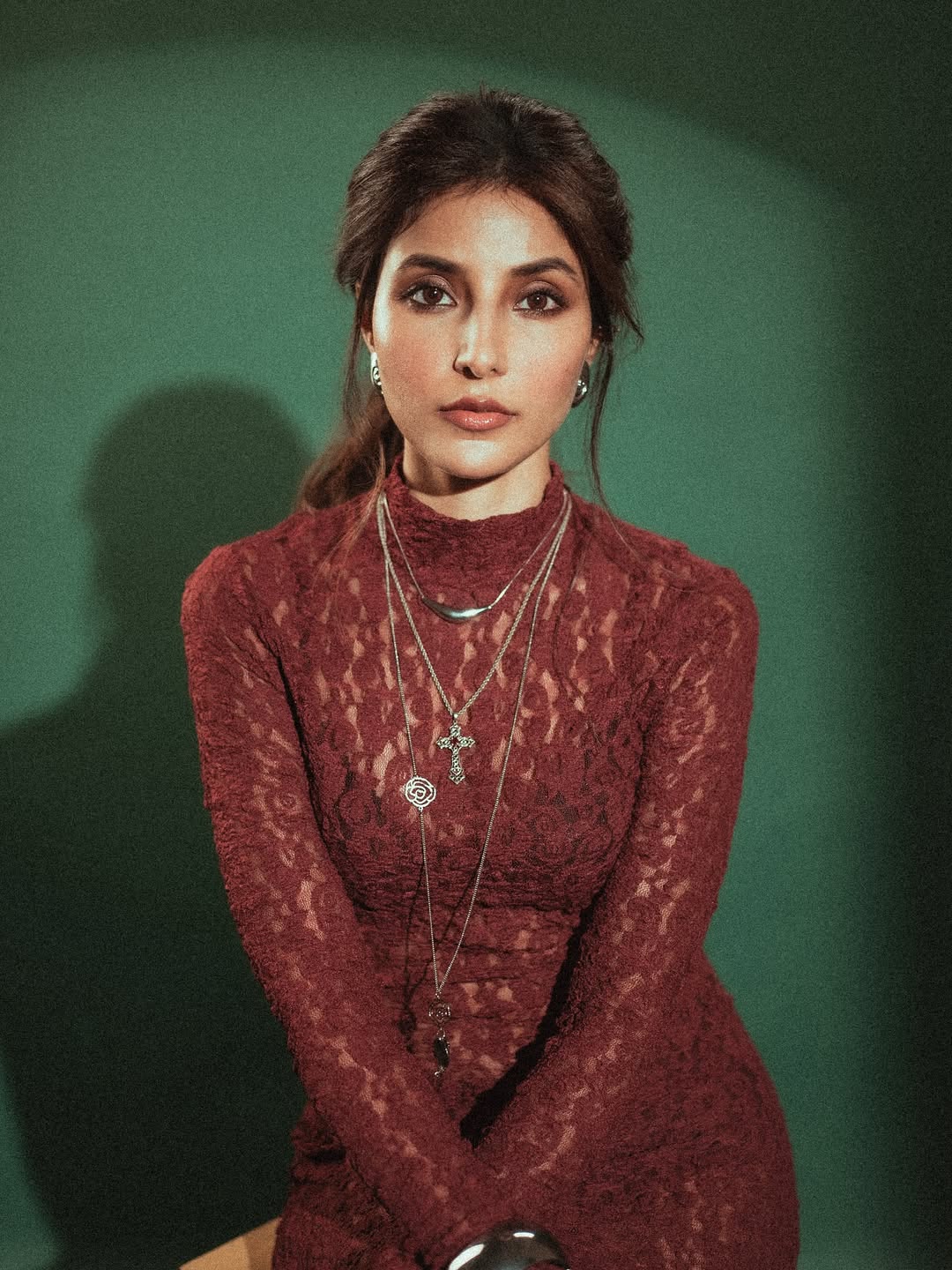 Harshita Gaur effortlessly blends gothic glamour with a dash of playful attitude–proof that lace, layered necklaces, and a confident pose are the ultimate recipe for style that’s both fierce and fun.