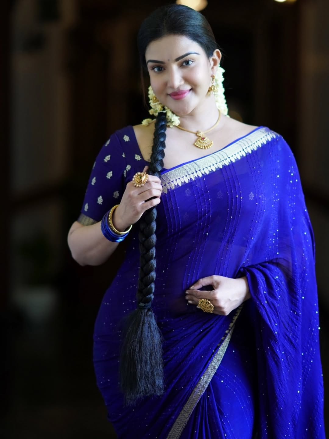 Honey Rose in royal blue saree elegance