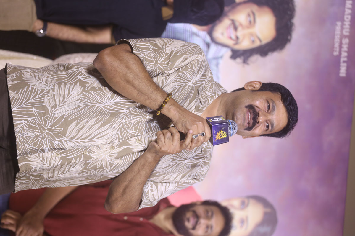 Actor Giridhar delivering speech at event
