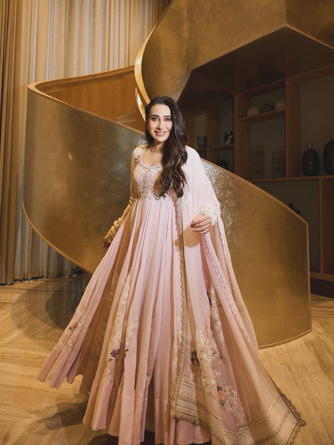 Karisma Kapoor regal elegance in pastel pink