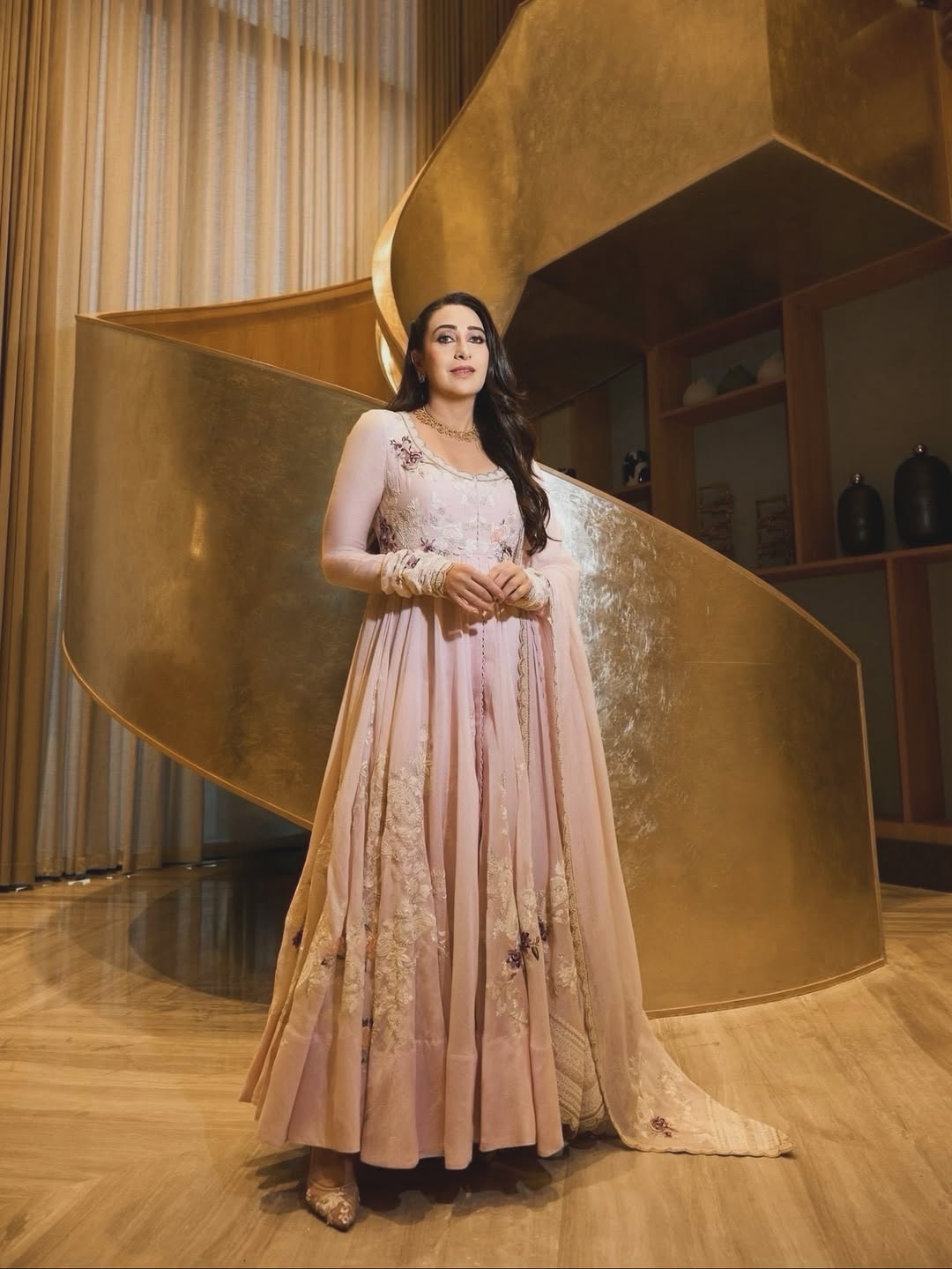 Karisma Kapoor radiates elegance in pastel ensemble